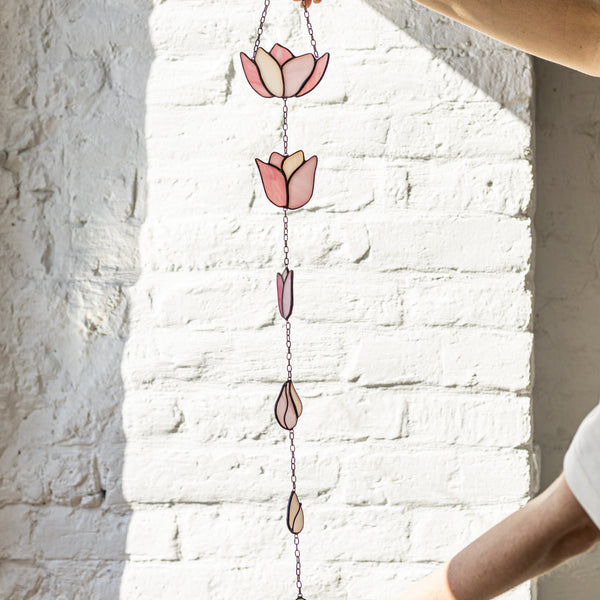 Colorful handmade tulip stained glass sun catcher, ideal for hanging in windows or on walls, perfect gift for nature and flower enthusiasts