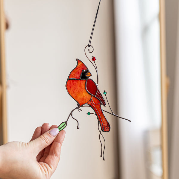 Handmade stained glass cardinal suncatcher, crafted using Tiffany technique, vibrant red bird design, perfect for windows, walls, patios, or as a thoughtful gift