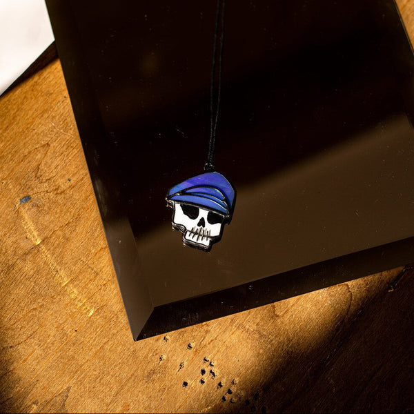 Skull brooch