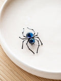 Crow brooch